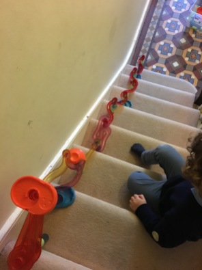 The Marbles run down the stairs