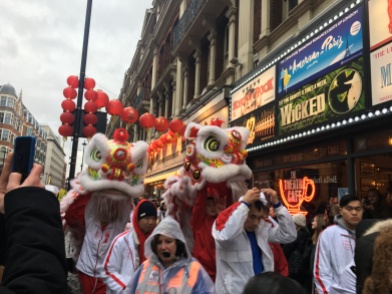 Chinese dragons dancing through th crowds